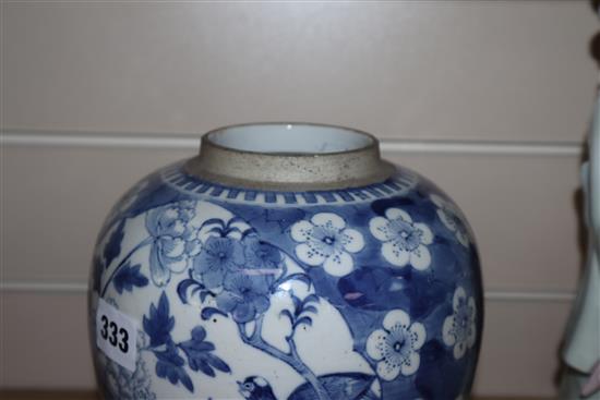 Two Chinese blue and white jars and covers and a pair of hardwood stands